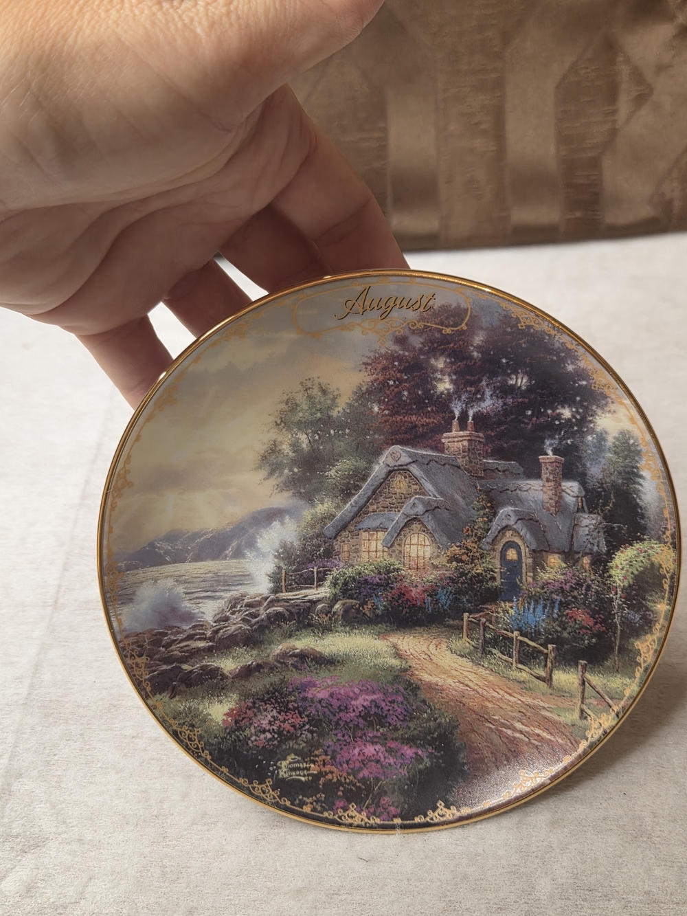 August Thomas Kinkade Round Collector Plate - Purple, Green, Blue, Brown, Gold